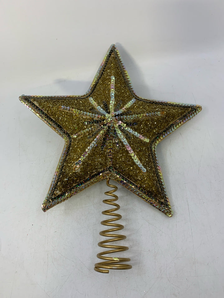 GOLD SEQUENCE STAR SHAPED TREE TOPPER.
