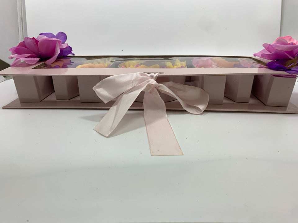 "MOM" FLOWERS IN PINK BOX.
