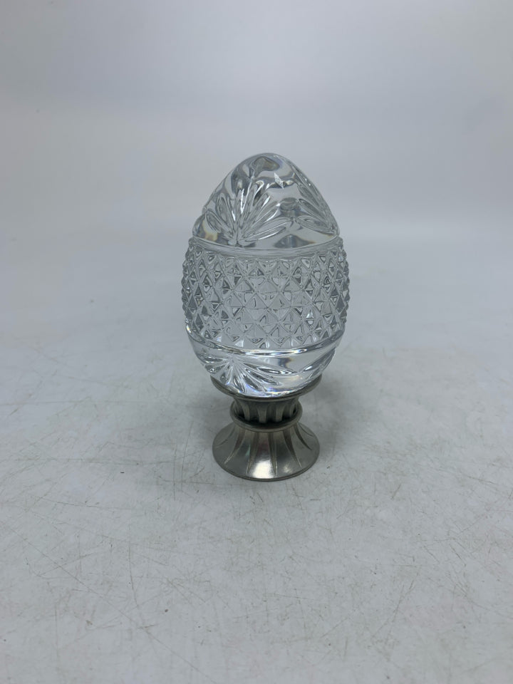 HEAVY GLASS TEXTURE EGG ON METAL STAND.