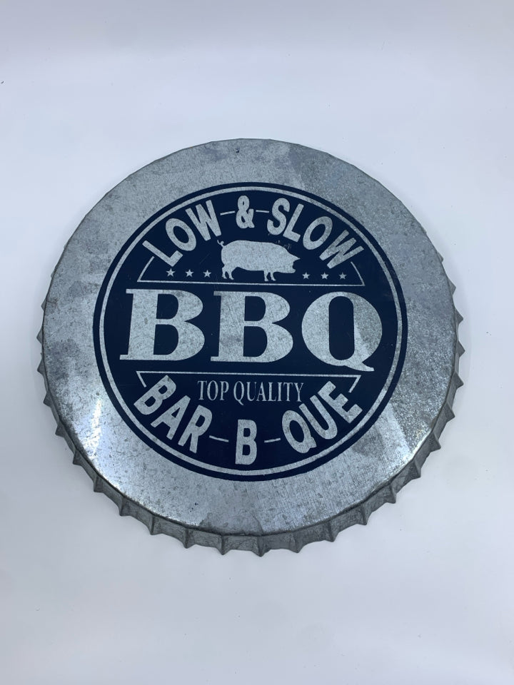 BBQ BOTTLE TOP WALL ART.