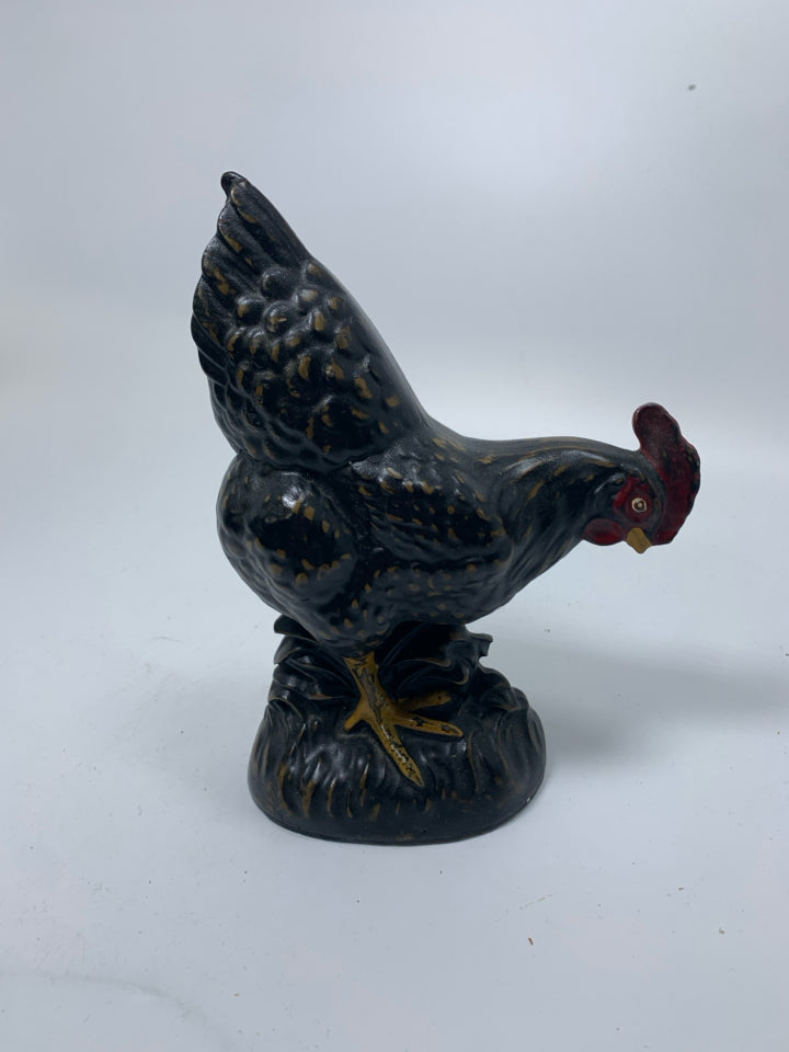 BLACK CHICKEN LOOKING DOWN RUSTIC.