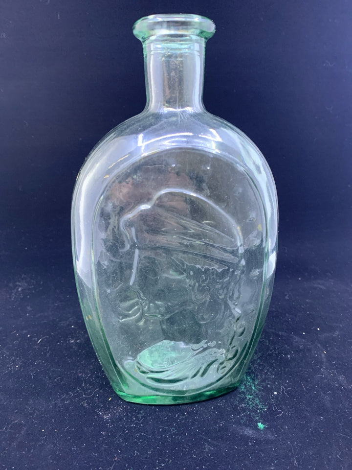 EMBOSSED GLASS BOTTLE.