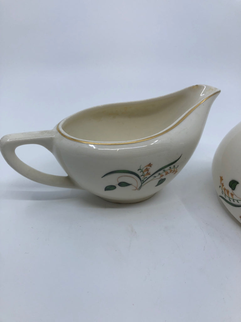 VTG YELLOW AND GREEN FLORAL CREAMER AND SUGAR.