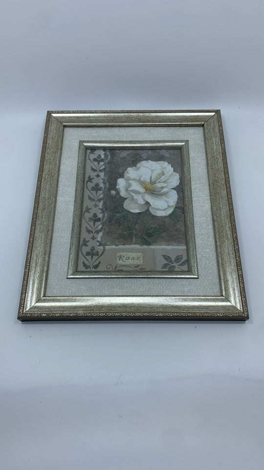 WHITE ROSE PRINT IN SILVER FRAME.