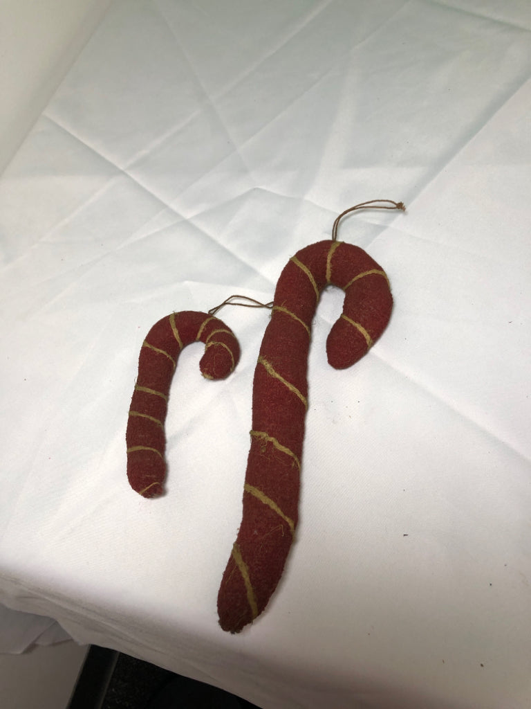 2 PRIMITIVE CANDY CANE.