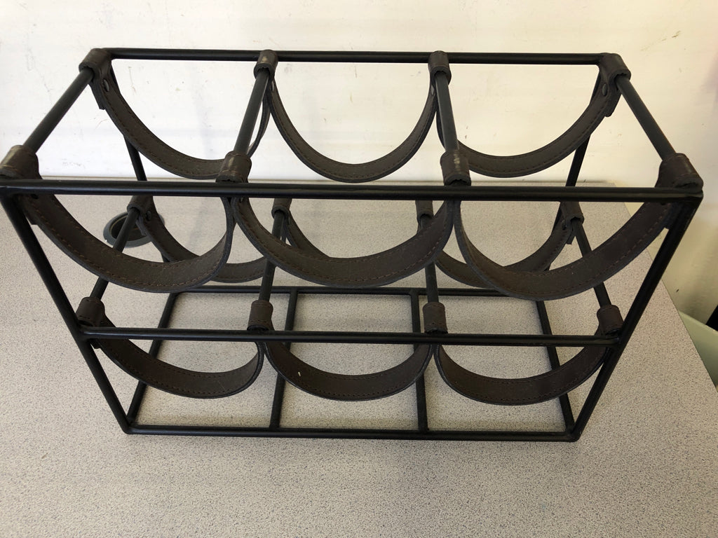 BLACK METAL WINE RACK W FAUX LEATHER HOOKS.