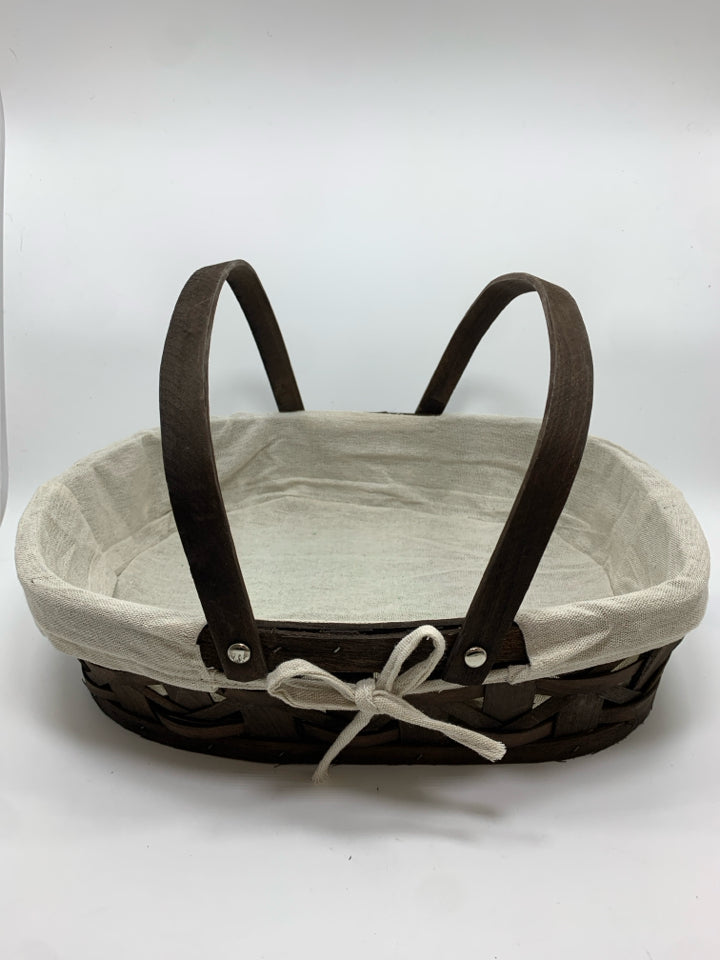 BROWN SHALLOW BASKET W/FABRIC LINING 2 HANDLES.