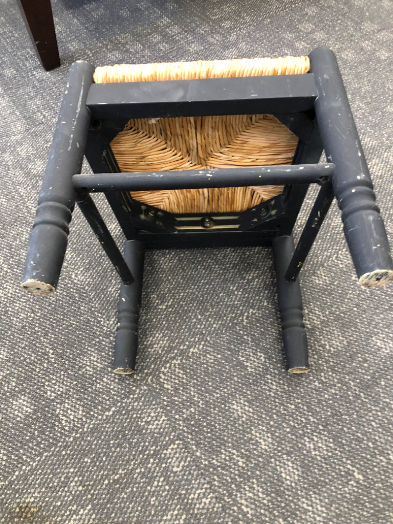 KIDS BLACK TABLE W/2 WICKER CHAIRS.