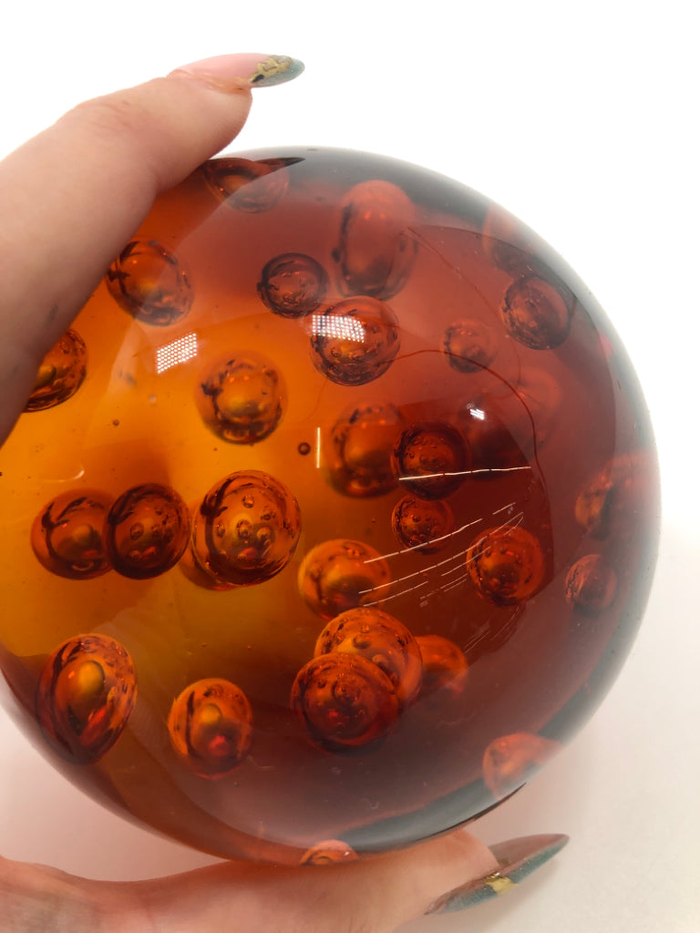 LG AMBER GLASS BUBBLE PAPER WEIGHT.