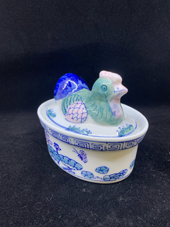 OVAL CERAMIC WHITE CONTAINER BLUE/GREEN/PINK DETAILS W/ ROOSTER LID.