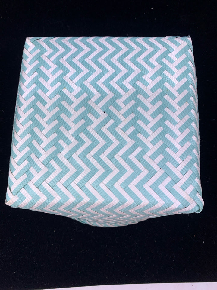 TEAL AND WHITE WOVEN BASKET.