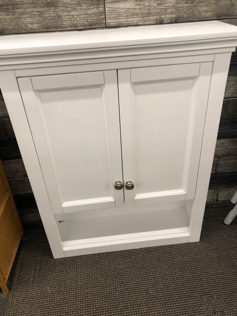 WALL MOUNT CABINET W/ LOWER SHELF.