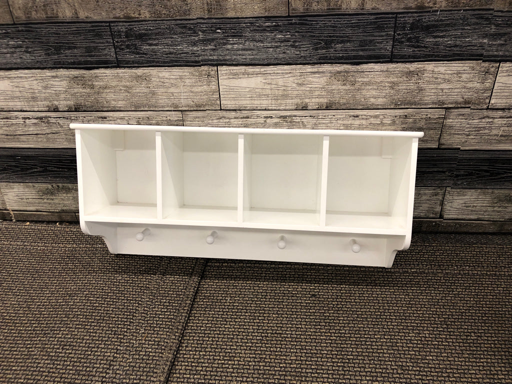 WHITE CUBBY WALL SHELF W/COAT HOOKS.