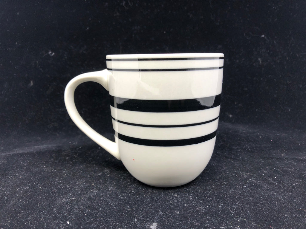 4 WHITE MUGS W/ BLACK STRIPES.