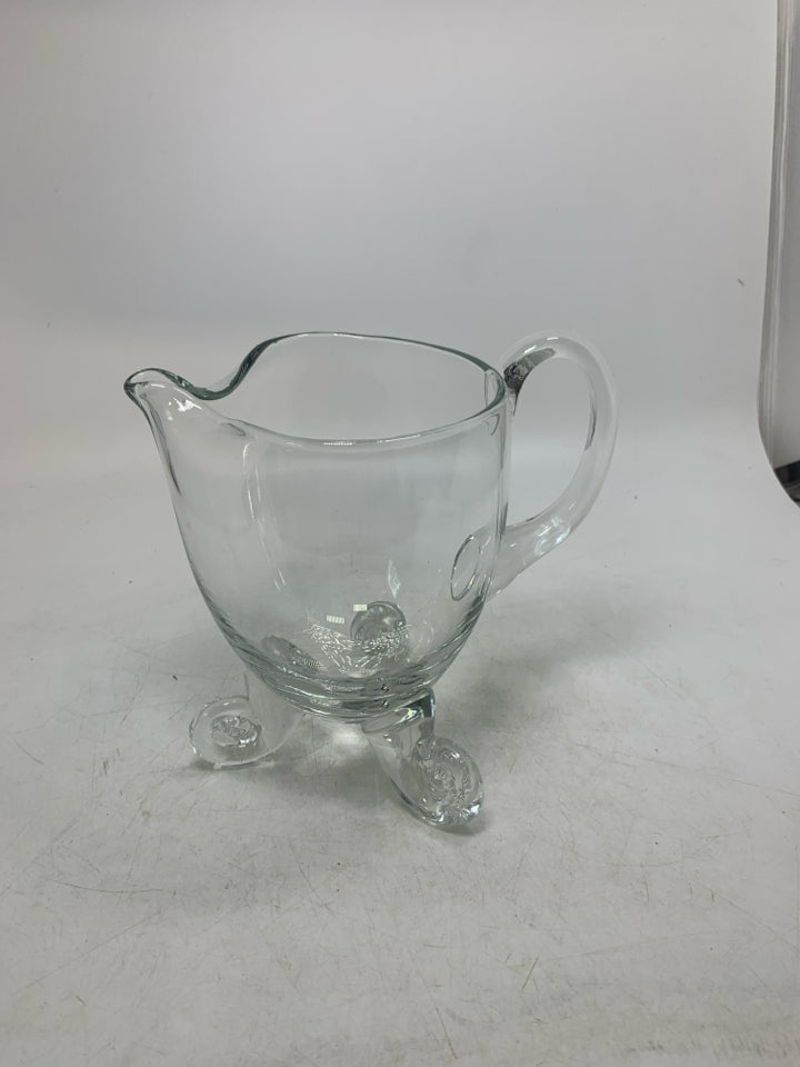 SWIRL FOOTED BLOWN GLASS PITCHER W/ ICE LIP.