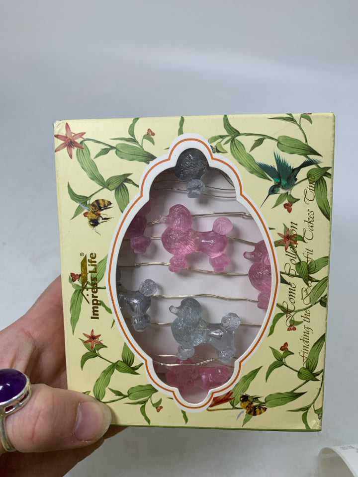 NIB POODLE STRING LIGHTS.
