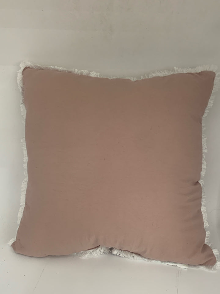 PALE PINK PILLOW W WHITE TASSELS.