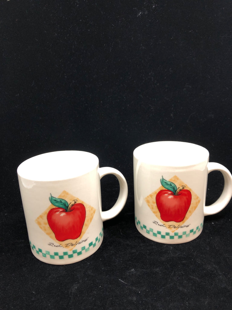 2 WHITE APPLE GREEN CHECKERED MUGS.