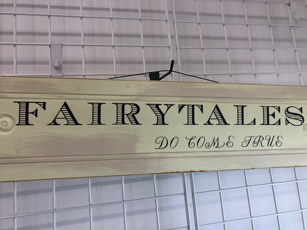 FAIRYTALES DO COME TRUE DISTRESSED WOOD WALL HANGING.