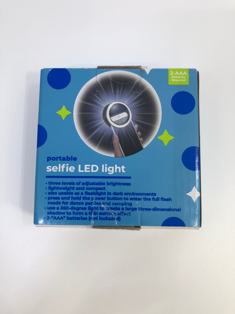 NIB PORTABLE LED SELFIE LIGHT.