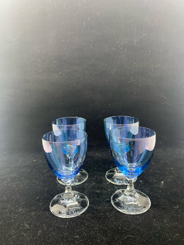 4 BLUE GLASS FOOTED WINE GLASSES.