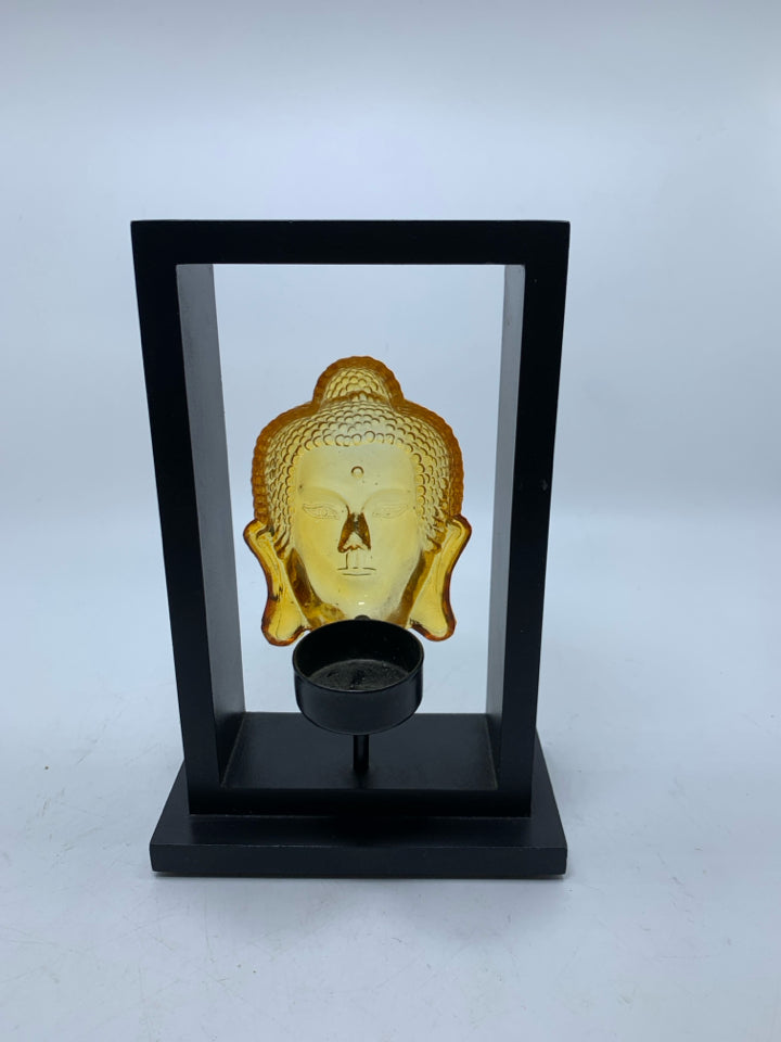 AMBER BUDDHA HEAD TEA LIGHT HOLDER.
