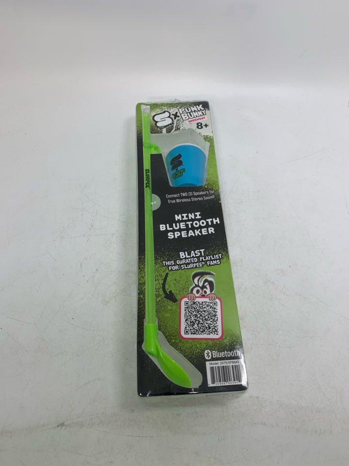 NIP GREEN DAY MINI BLUETOOTH SPEAKER SHAPED AS SLURREE CUP.