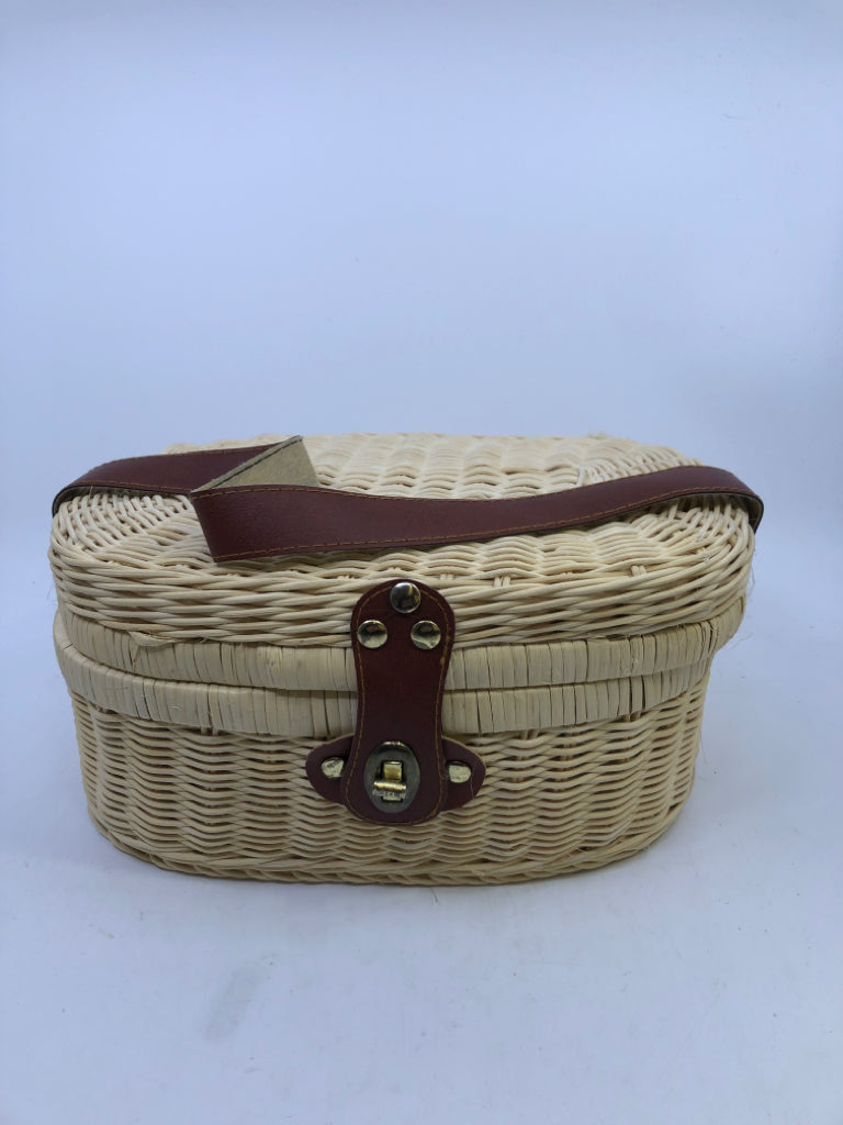 TEA SET IN BASKET W/BLUE FLORAL & HANDLE.