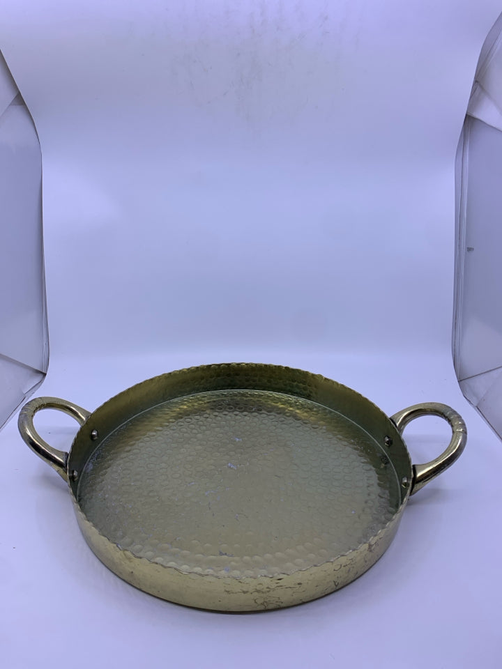 GOLD ROUND HAMMERED METAL TRAY W HANDLES.