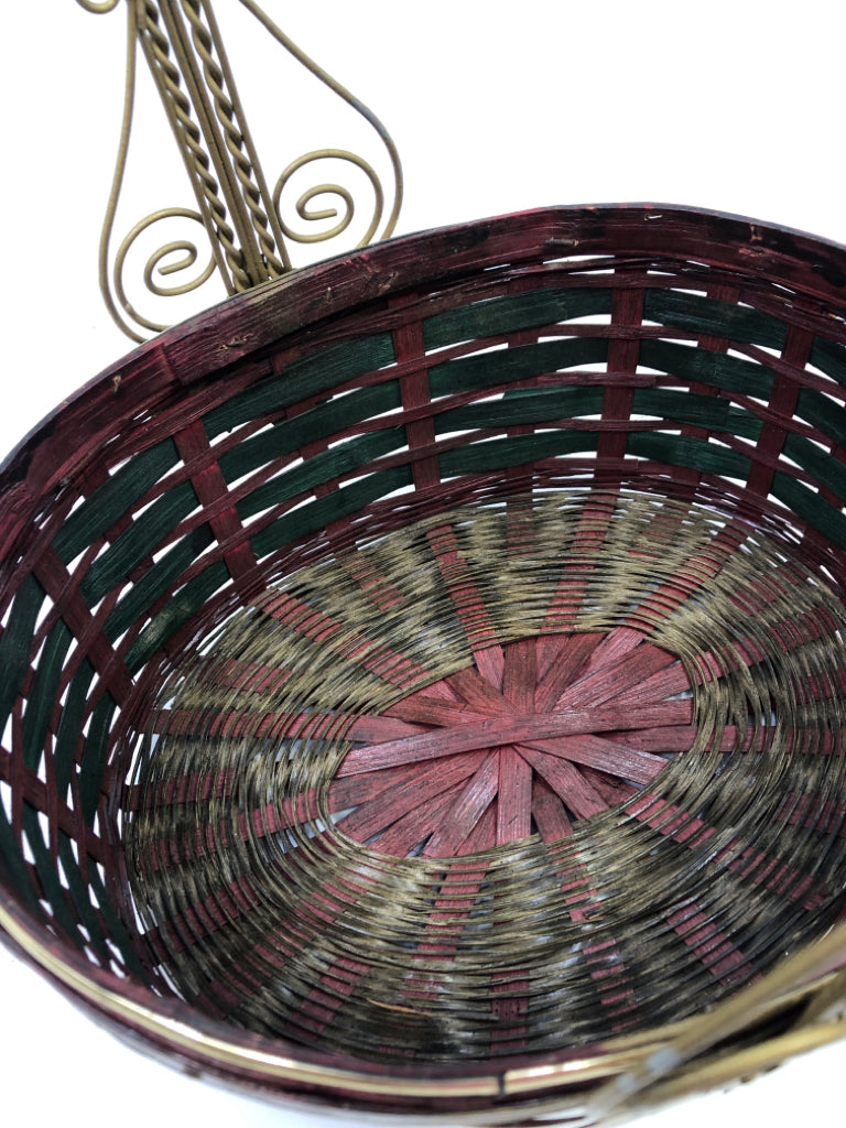 MAROON/GREEN BASKET WITH GOLD METAL HANDLE & LEAF.