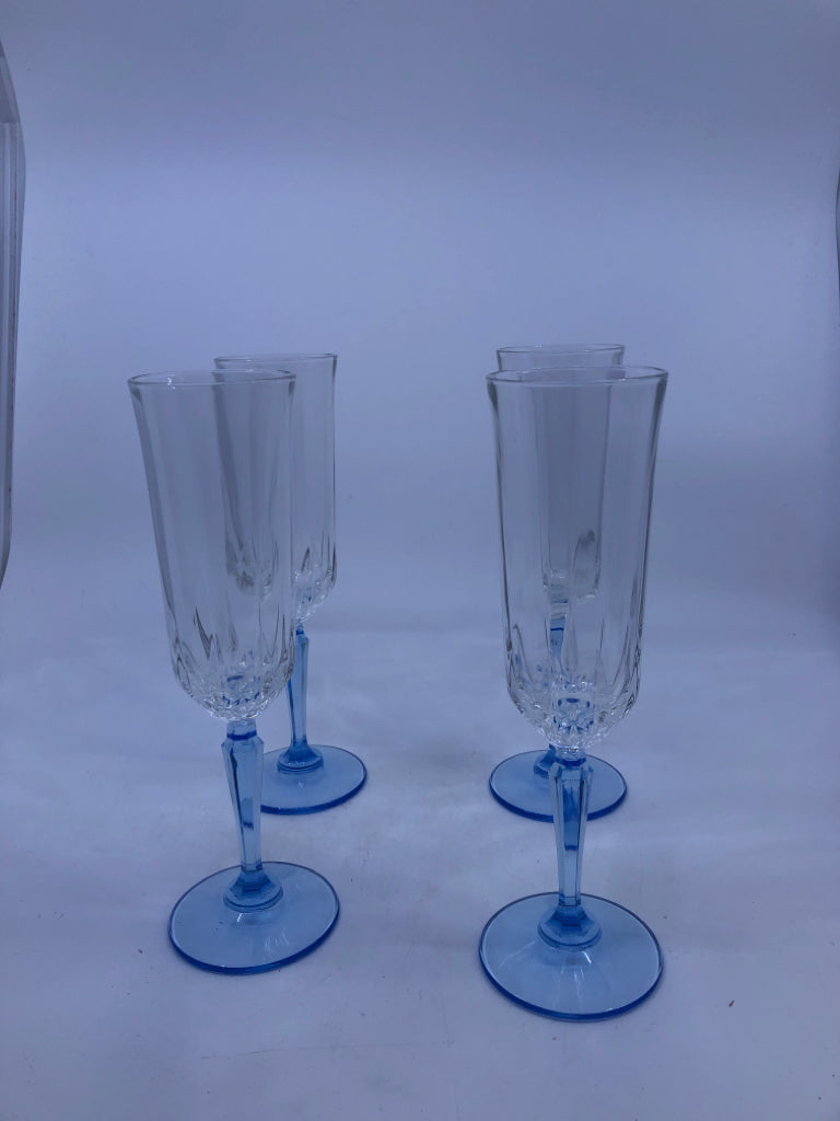 5 BLUE STEM CUT GLASS CHAMPAGNE FLUTES.