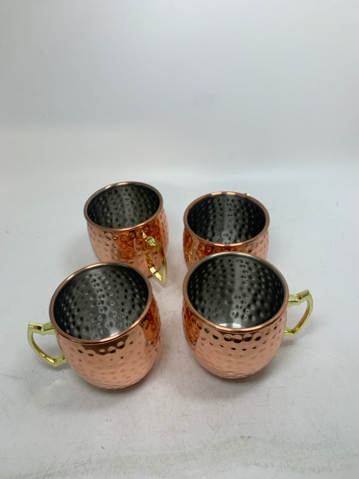 4 COPPER COLORED HAMMERED MOSCOW MULE MUGS.