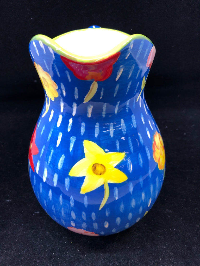BLUE FLORAL PAINTED PITCHER.