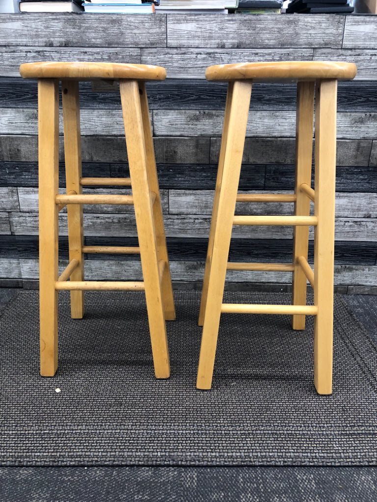 2 BLONDE WOOD STOOLS.