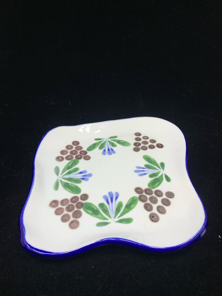 GRAPES PAINTED WAVY EDGE POTTERY PLATE.