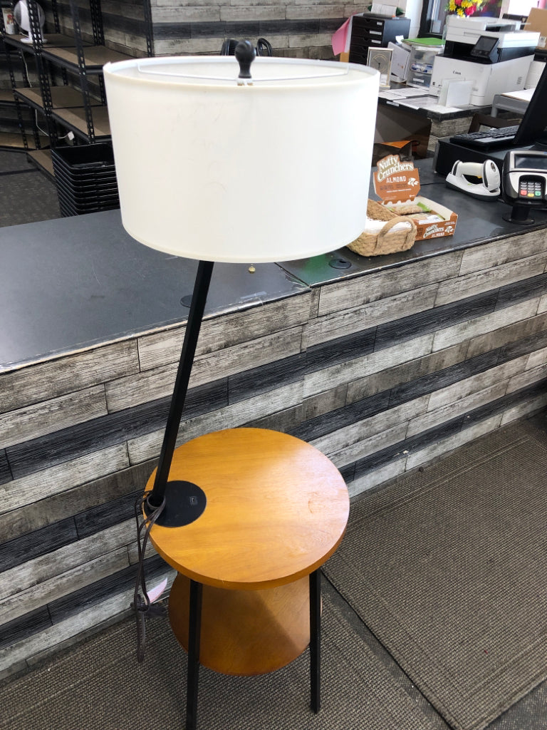 BLONDE WOOD TABLE W ATTACHED LAMP AND OUTLET.