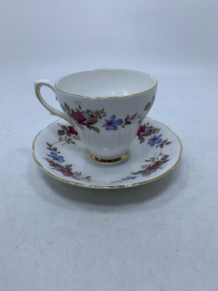 MULTI- COLORED FLOWERS TEACUP/SAUCER.