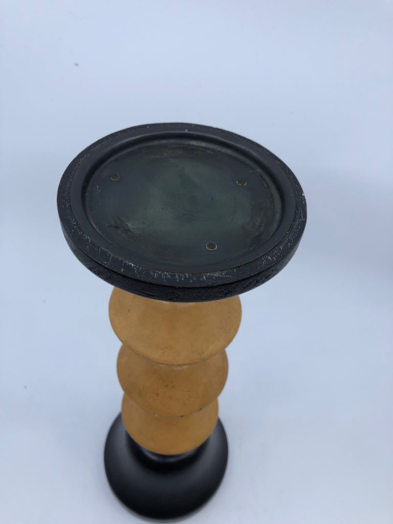 BLACK AND TAN PILAR CANDLE HOLDER.