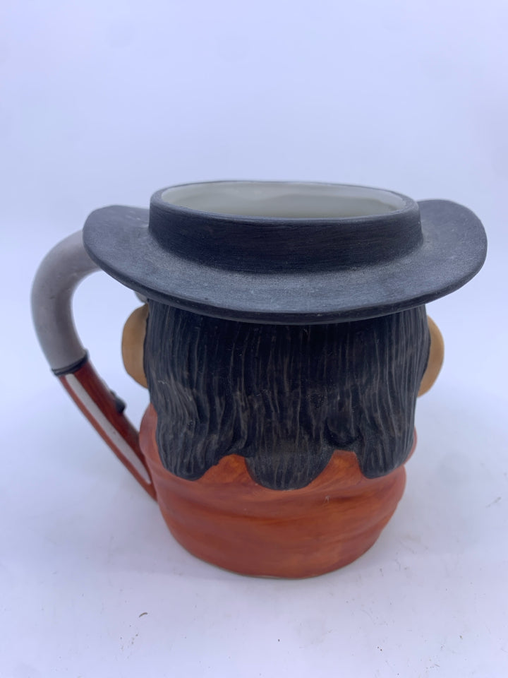 VTG MAN W BLACK HAT MUG.