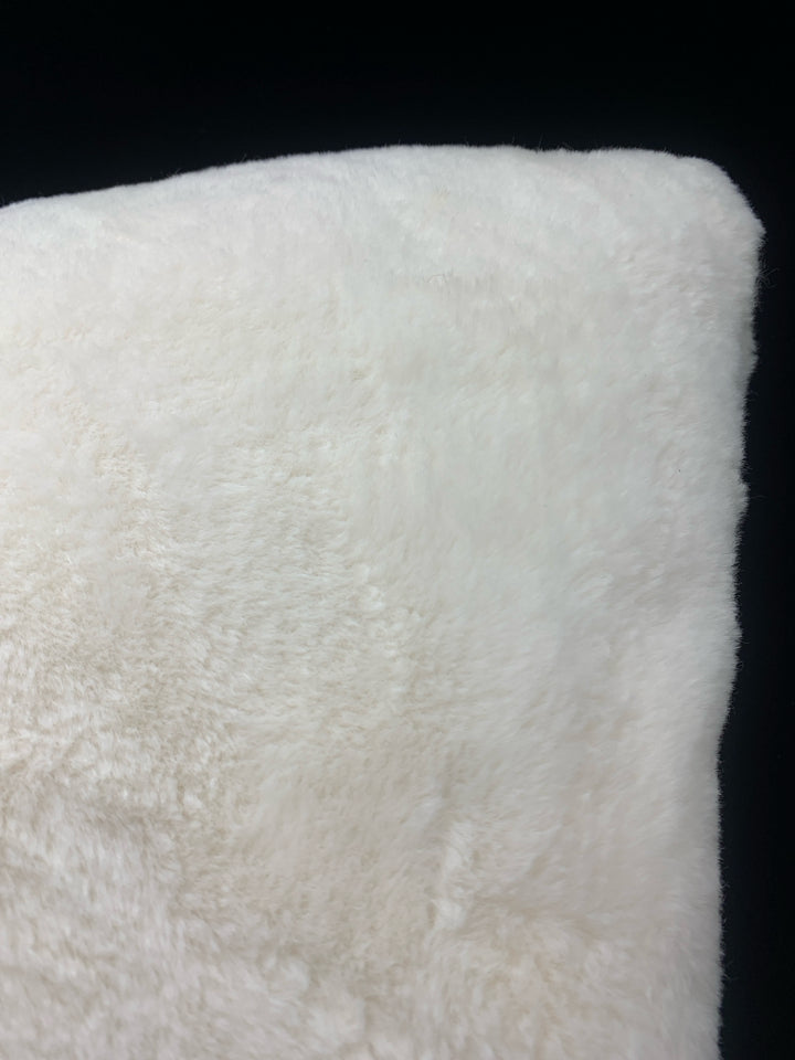 FLUFFY WHITE PILLOW.