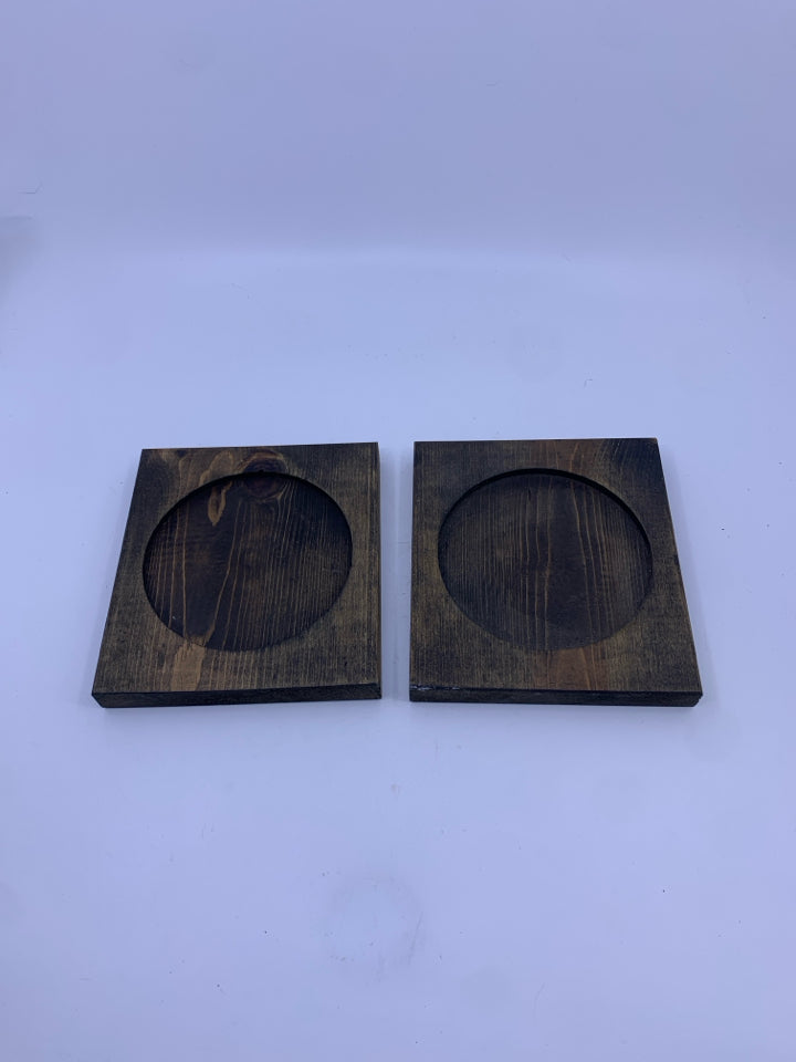 2 WOOD CANDLE PLATES.