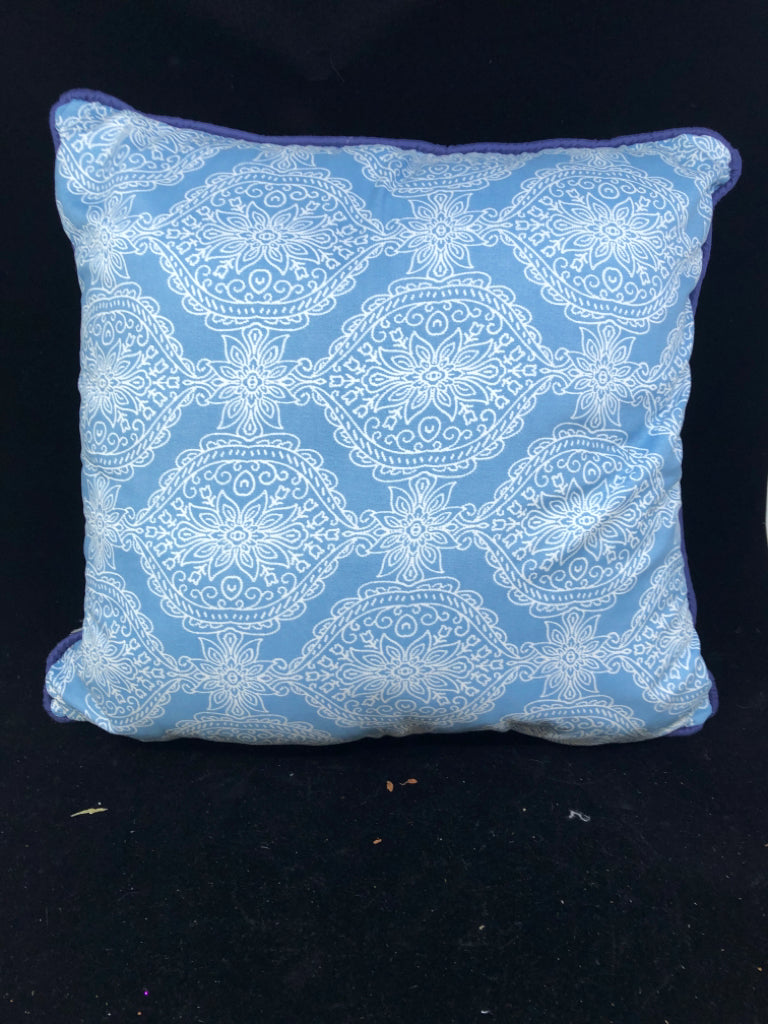 BLUE AND WHITE PATTERN W SOLID BLUE SQUARE PILLOW.