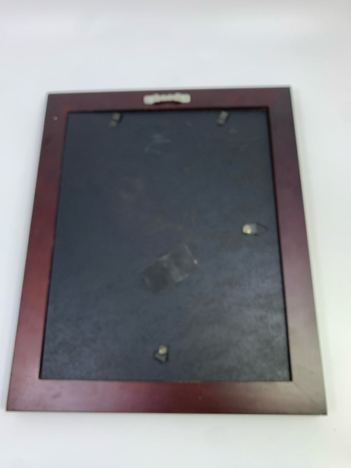 FLORAL PRINT IN BROWN FRAME.