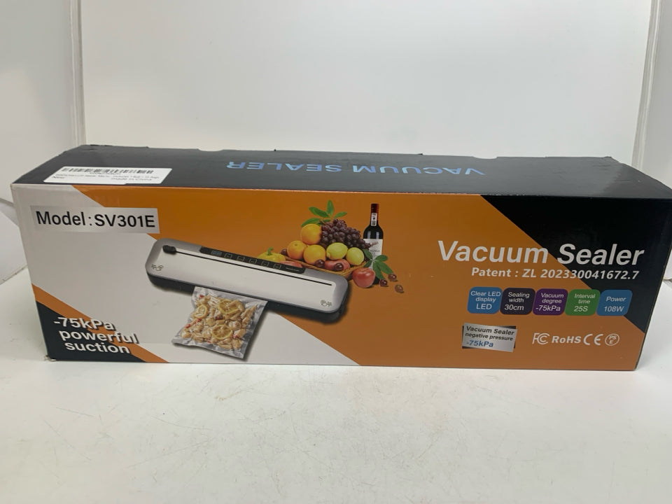 NIB VACUUM SEALER MACHINE.