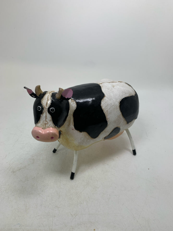 RESIN COW W/ METAL ACCENTS.