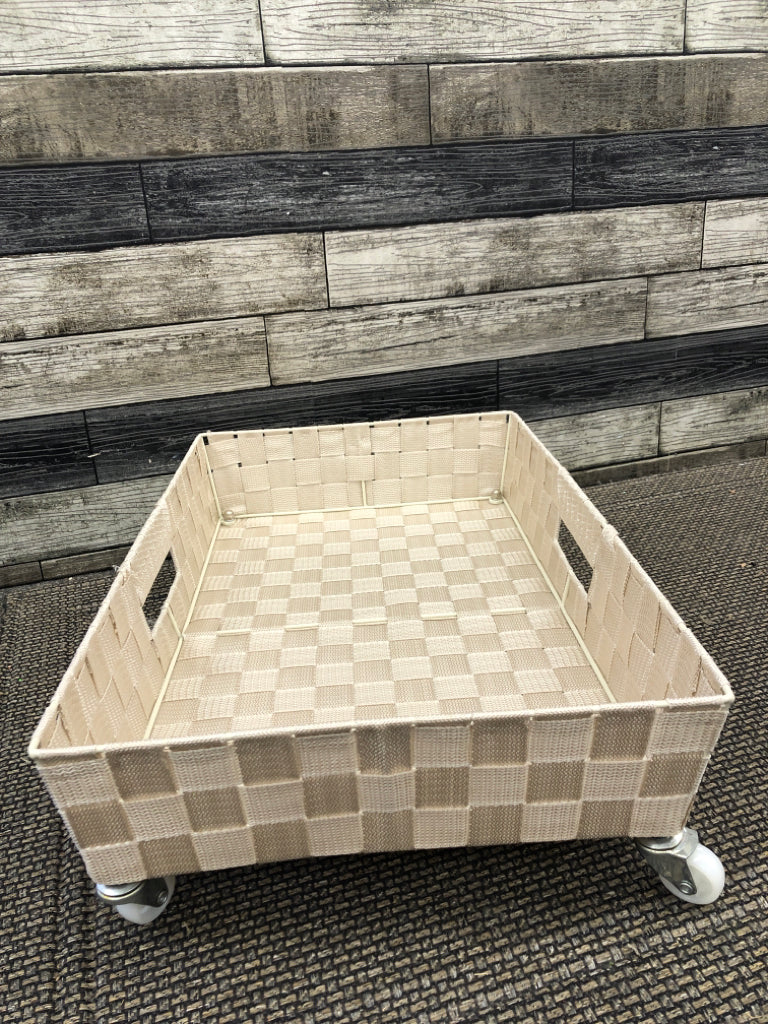 LIGHT ROSE UNDER BED STORAGE W WHEELS.