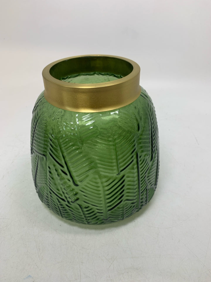 TEXTURED DARK GREEN VASE W/ GOLD METAL TOP.
