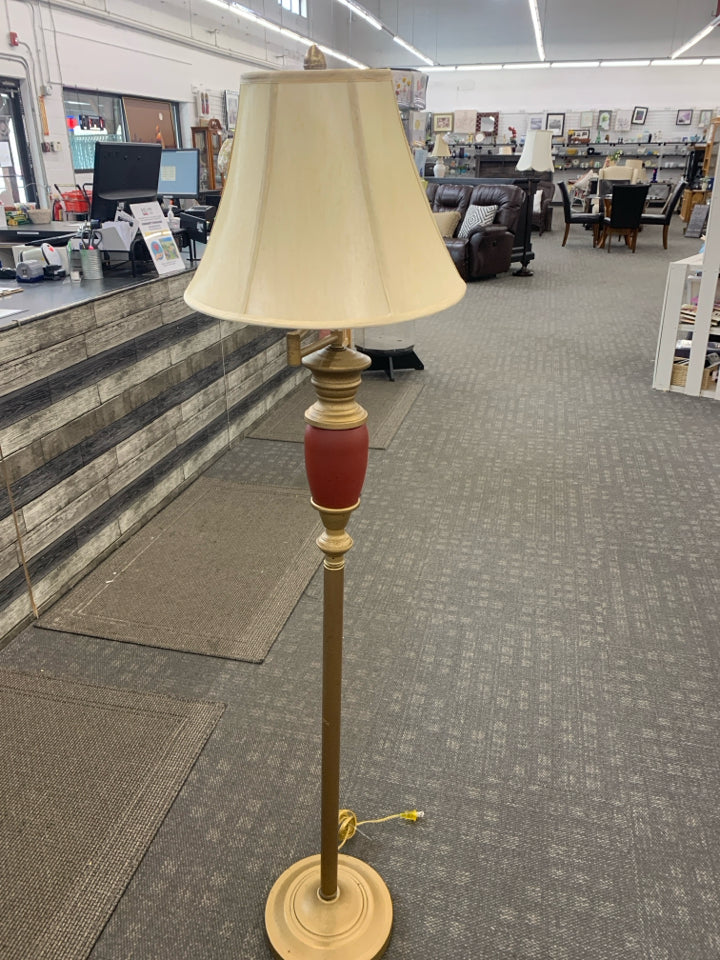 RED/GOLD SPECKLED LAMP W/TAN SHADE.