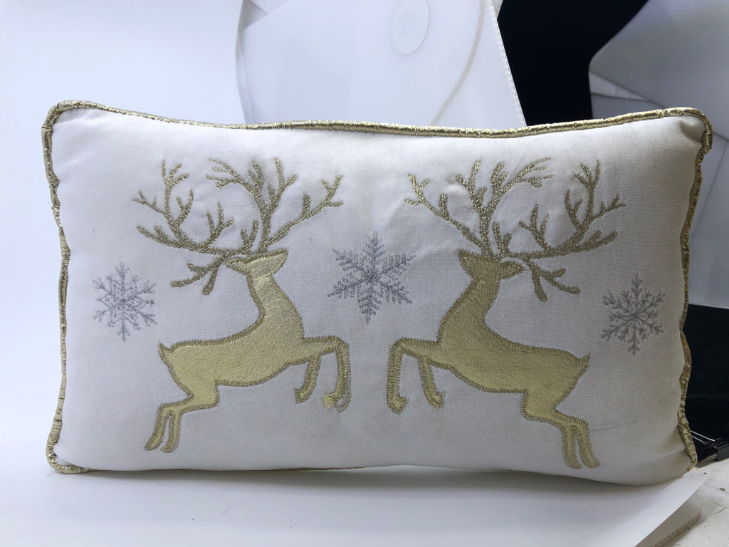 GOLD AND WHITE DEER PILLOW.
