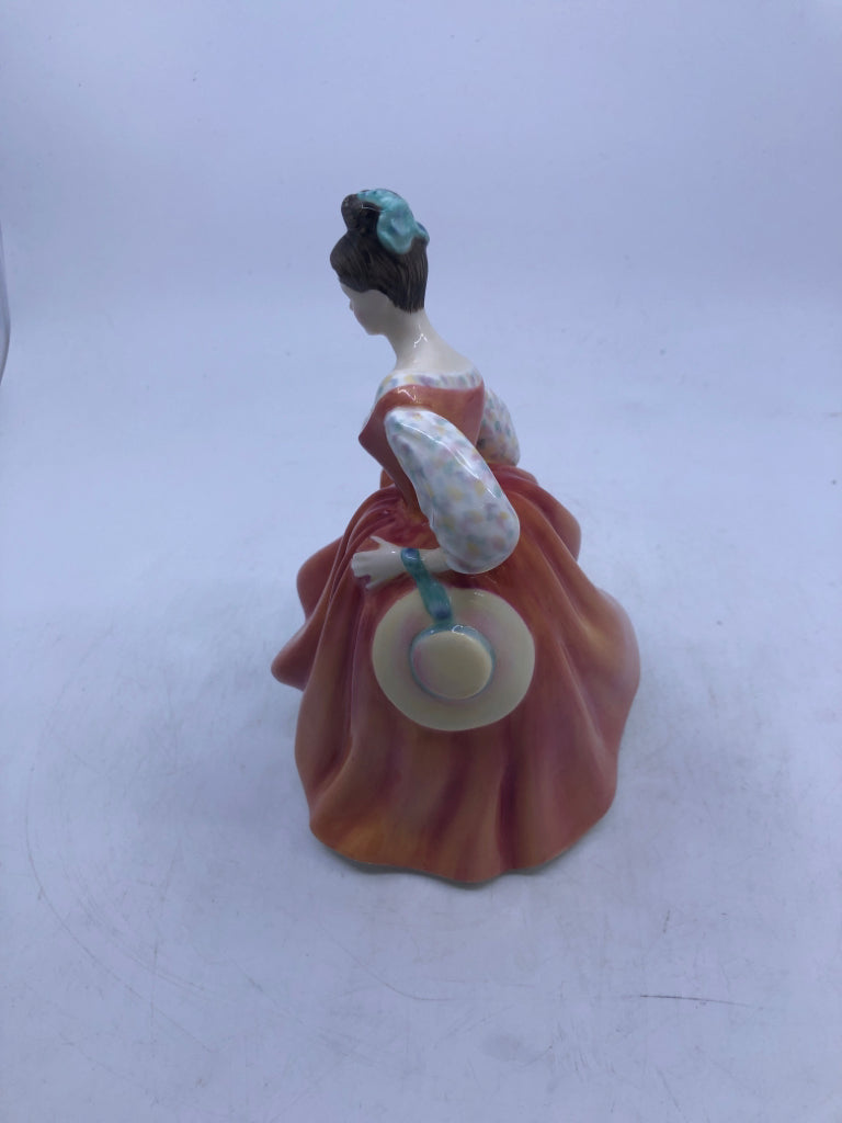 FAIR LADY IN CORAL DRESS W TEAL BOW.